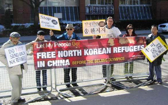 Rev. Tim Peters leads a demonstration in Toronto, Canada