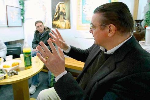 Rev. Tim Peters speaks at the Catacombs, weekly meetings he holds