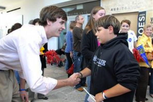 Jordan Thomas shakes hands 